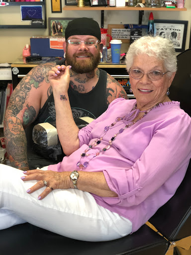 Explore godson tattoo ideas, creative tattoo ideas in Liberty, available at Dark Lotus Tattoo & Salon