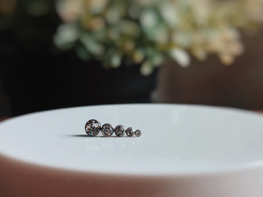 Explore sigil tattoo ideas, creative tattoo ideas in Champaign, available at Almost Famous Body Piercing