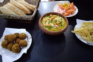 مطعم طارق للماكولات الشعبية image