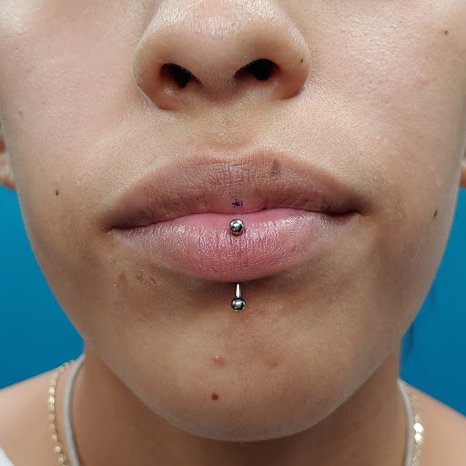 Explore david bowie tattoo ideas, creative tattoo ideas in San Marcos, available at Ollie the Impaler Body Piercing