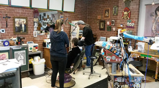 Explore cover up tattoo ideas on hand, creative tattoo ideas in Sigourney, available at Octopus Ink Professional Tattoo & Piercing