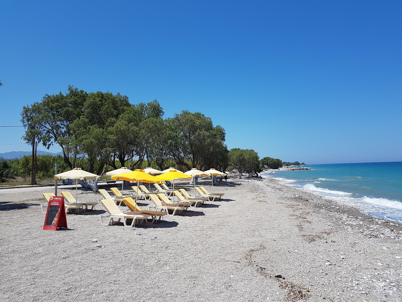 Foto av Soroni Beach med grå sand och småstenar yta