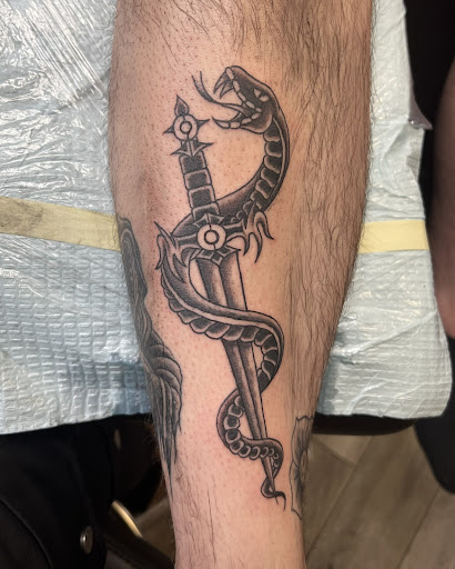 Explore simple hand tattoo ideas, creative tattoo ideas in Buffalo, available at True Gloom Tattoo Studio