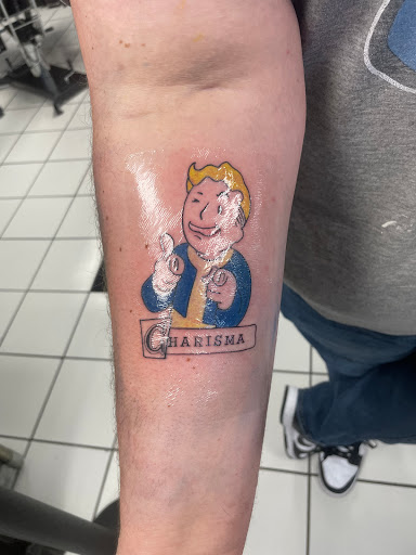 Explore fire force tattoo ideas, creative tattoo ideas in Sherwood, available at Golden Lotus Tattoo Studio