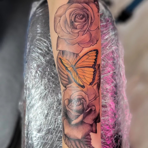 Explore thigh cover up tattoo ideas, creative tattoo ideas in Ocala, available at The Tattoo Gallery of Ocala LLC