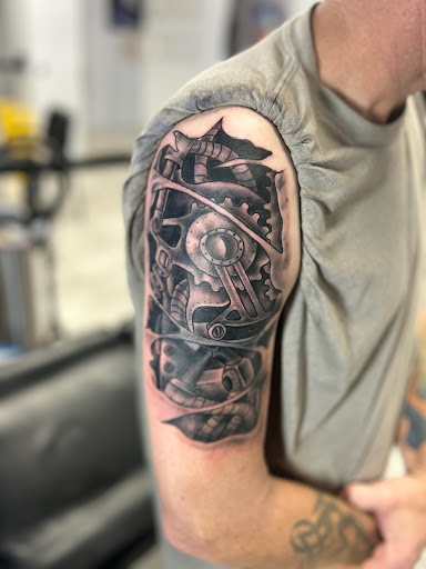 Explore birth year tattoo ideas for guys, creative tattoo ideas in Daytona Beach, available at Studio 21 Tattoo & Piercings Daytona Beach