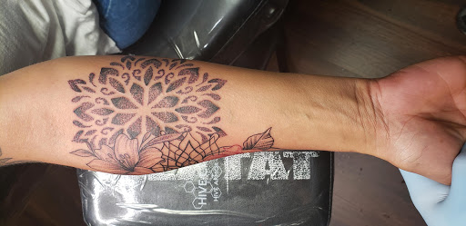 Explore family arm sleeve tattoo ideas, creative tattoo ideas in Fort Worth, available at Voodoo Lounge Tattoo and Piercing Studio
