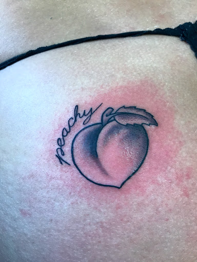 Explore red ink tattoo ideas for guys, creative tattoo ideas in Kalispell, available at The Temple Decor