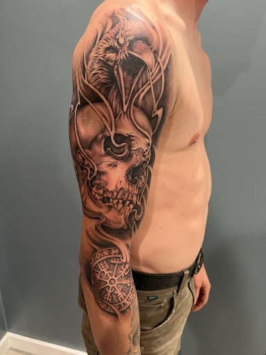 Explore small tribal tattoo ideas, creative tattoo ideas in Kingsford, available at Deft Tattoo Studio