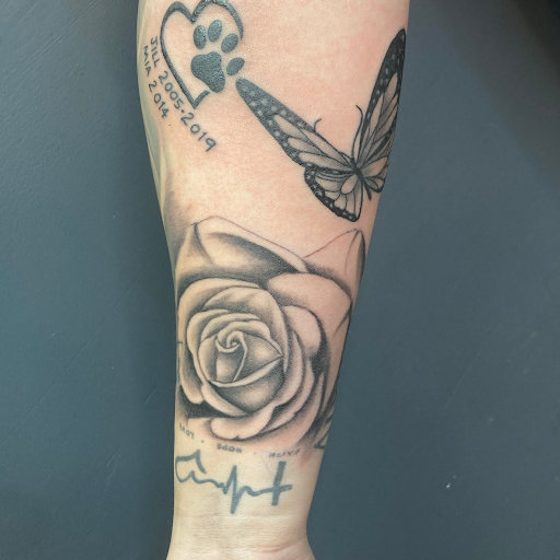 Explore forearm half sleeve tattoo ideas, creative tattoo ideas in Cadillac, available at Limitless Ink Tattoo Studio