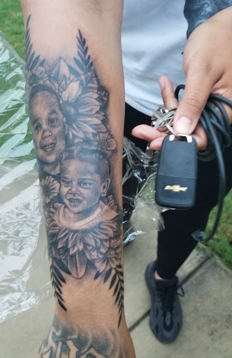 Explore red ink neck tattoo ideas, creative tattoo ideas in Round Rock, available at Beto Tats