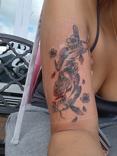 Explore jigsaw tattoo ideas, creative tattoo ideas in Orange Park, available at Fantasy Tattoo and Piercing