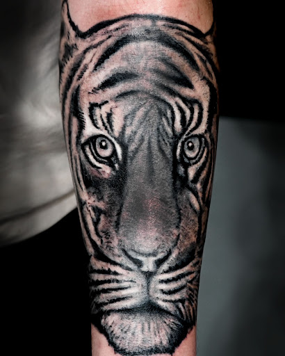 Explore symbol tattoo ideas, creative tattoo ideas in Saint Petersburg, available at Phoebus Tattoos