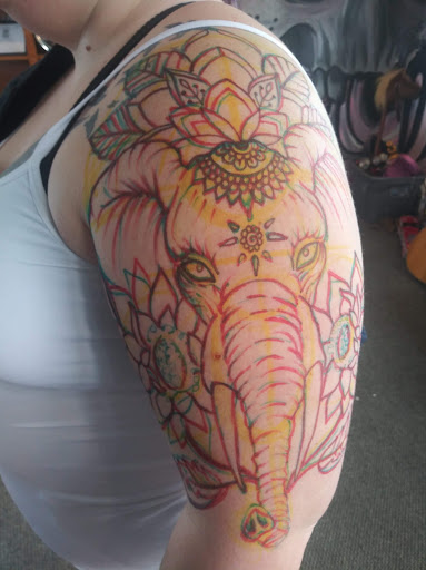 Explore banjo tattoo ideas, creative tattoo ideas in Jackson, available at T.R.A.P. Ink Tattoos and Piercings