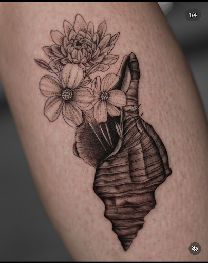 Explore religious elbow tattoo ideas, creative tattoo ideas in Fort Wayne, available at Grade A Tattoos and Body Piercing