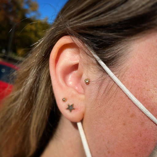 Explore alpha tattoo ideas, creative tattoo ideas in Cary, available at Fine Art Body Piercing By Lilith Mae