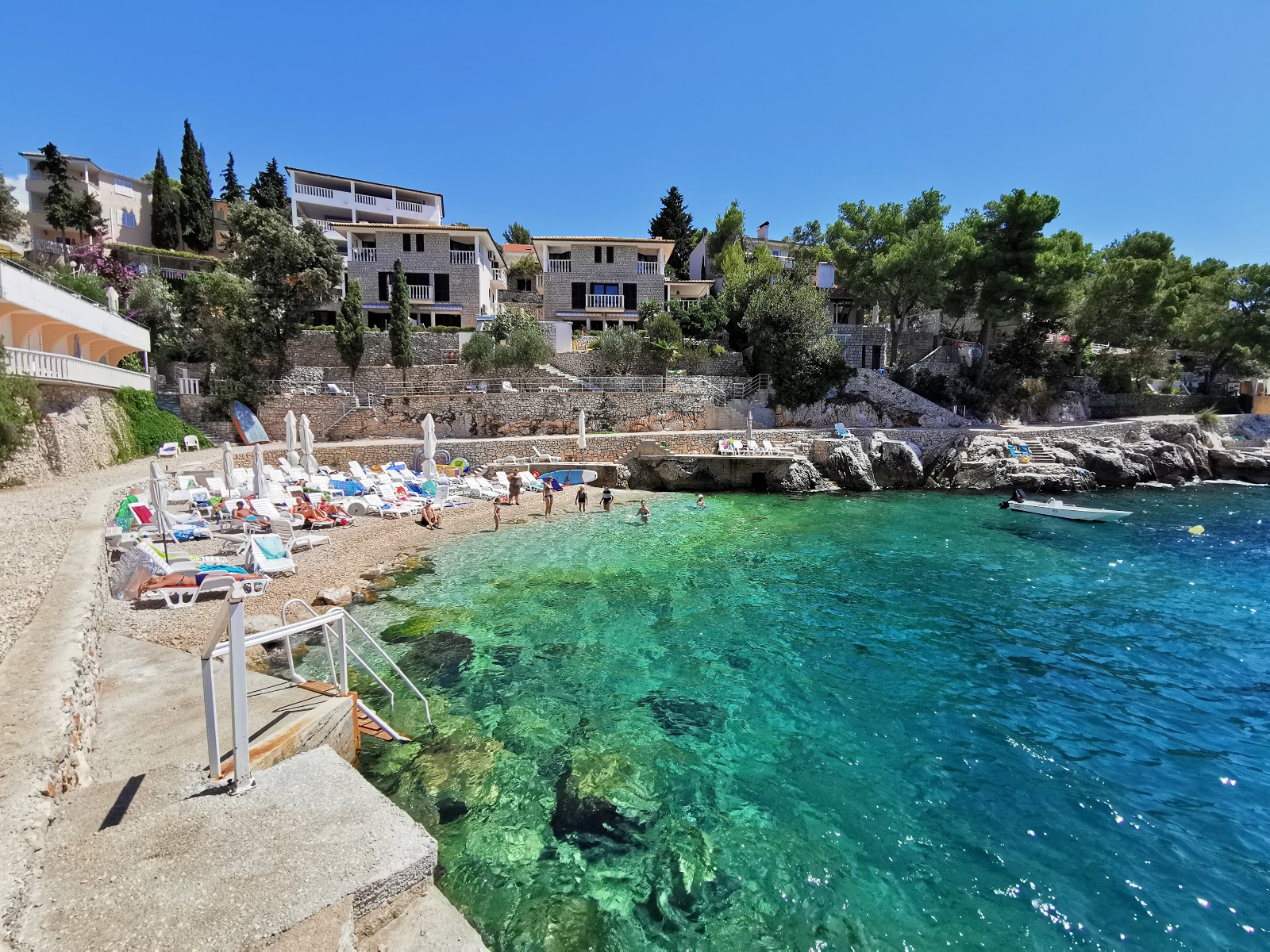 Photo de Tepli Bok Beach avec rivage droit, court