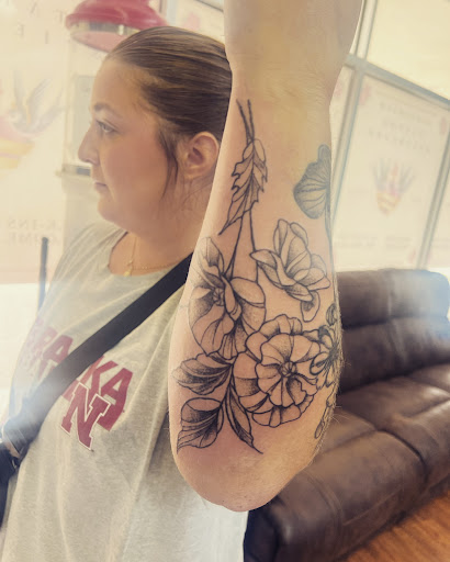 Explore unique tramp stamp tattoo ideas, creative tattoo ideas in Cocoa, available at Rorschach Tattoo Shop and Piercing Studio