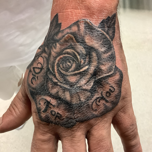 Explore lower back tattoo ideas for females, creative tattoo ideas in Turner, available at Heathen Ink