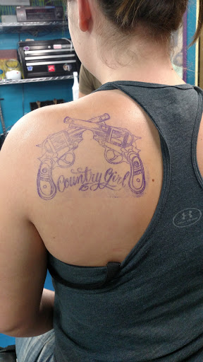 Tattoo Shop «Liquid Tattoo», reviews and photos, 16583 Old U.S. 27, Lansing, MI 48906, USA