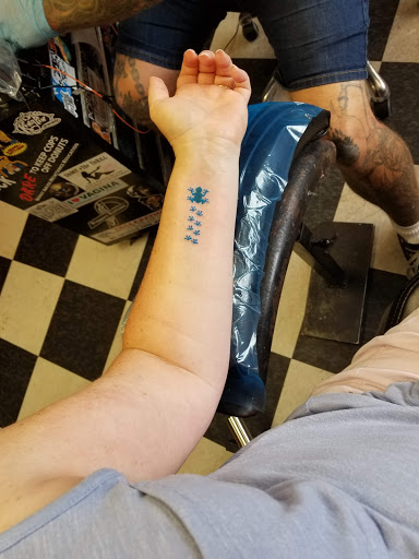 Explore photography tattoo ideas, creative tattoo ideas in Southport, available at Inklanation Custom Tattoos