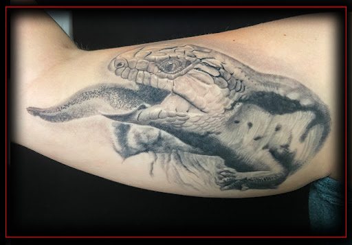 Explore blackout tattoo cover up ideas, creative tattoo ideas in Columbus, available at Eternal Tattoo & Body Piercing - Columbus