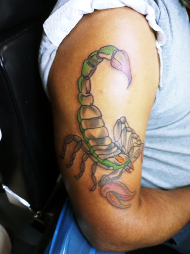 Explore nigerian tattoo ideas, creative tattoo ideas in Lakeland, available at 360 INKpressions