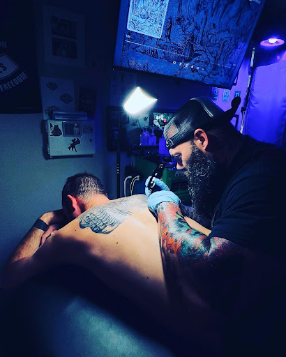 Explore neck tattoos for women ideas, creative tattoo ideas in Gautier, available at Voodoo Tattoo