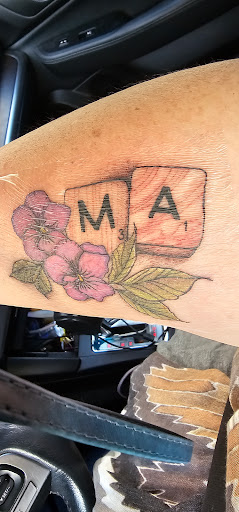 Explore grumpy bear tattoo ideas, creative tattoo ideas in East Providence, available at Ink Therapy