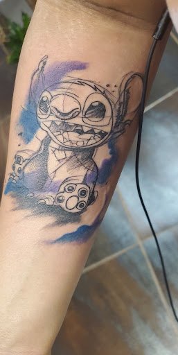 Explore iris flower tattoo ideas, creative tattoo ideas in Pico Rivera, available at Latin Skulls