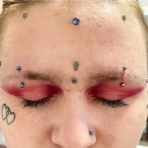 Explore spiral tattoo ideas, creative tattoo ideas in North Charleston, available at Exotic Impressions Body Piercing