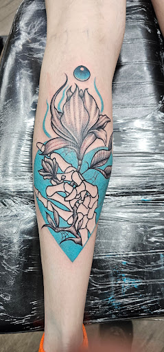 Explore smiley face tattoo ideas, creative tattoo ideas in Cheyenne, available at The T.R.I.B.E. Zoo, LLC Tattoo