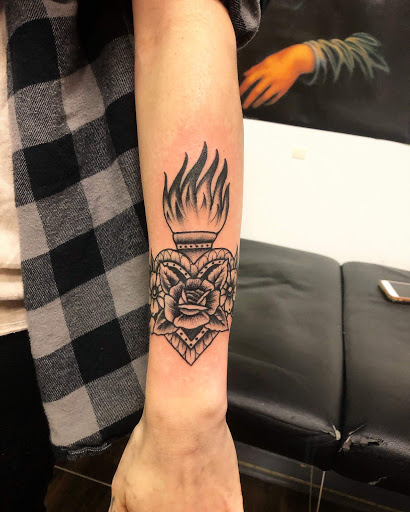 Explore women's wrist tattoo ideas, creative tattoo ideas in Goose Creek, available at Red Kirin Tattoo