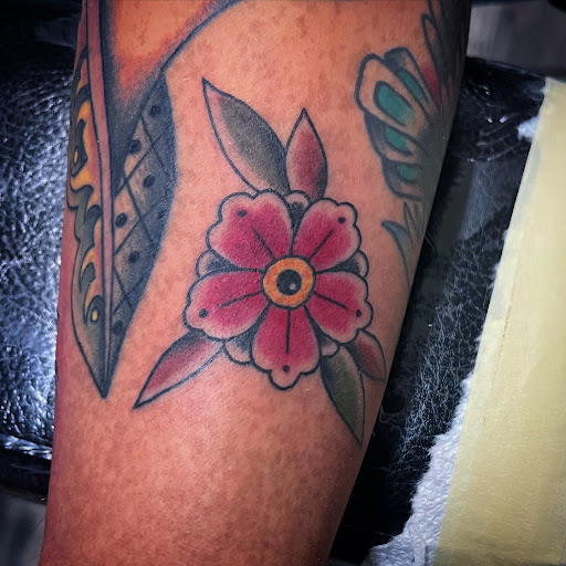 Explore tattoo ideas behind the ear, creative tattoo ideas in Madera, available at Sea Wolf Tattoo