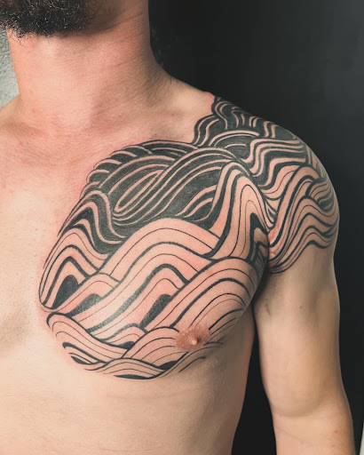 Explore chin tattoo ideas, creative tattoo ideas in Scarsdale, available at Damm Nice Tattoo & Body Art