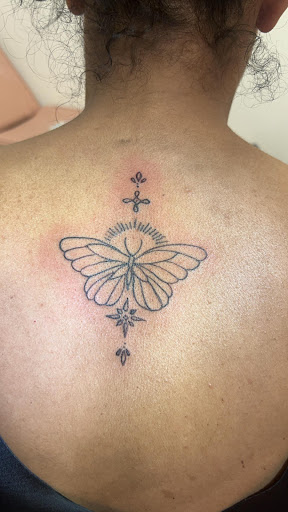 Explore hand tattoos men ideas, creative tattoo ideas in Wisconsin Dells, available at Twisted Dimensions Tattoo Studio