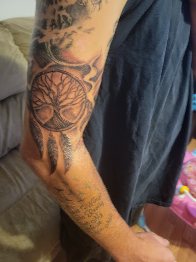 Explore heart and rose tattoo ideas, creative tattoo ideas in Albuquerque, available at Factory Edge Tattoo and Piercing Coronado