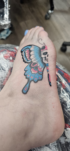 Explore thigh hip tattoo ideas, creative tattoo ideas in Cheyenne, available at The T.R.I.B.E. Zoo, LLC Tattoo