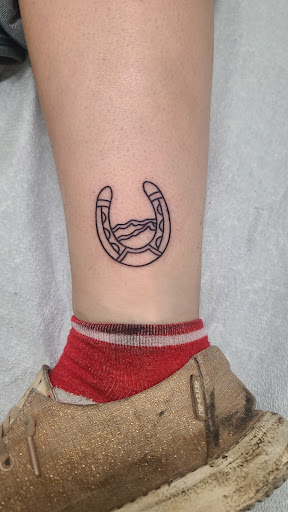 Explore cool hand tattoo ideas, creative tattoo ideas in Virginia Beach, available at Whiskey River Tattoo