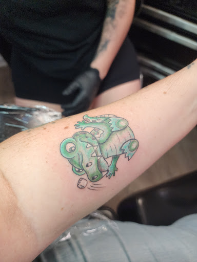 Explore tattoos for your son ideas, creative tattoo ideas in Reading, available at Neon Moon Tattoo