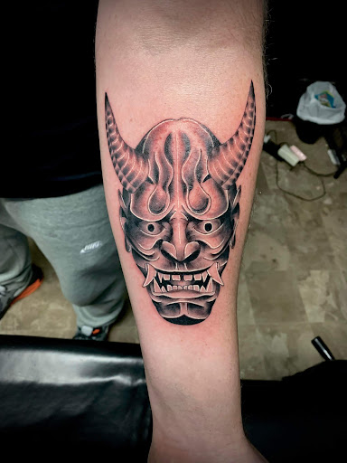 Explore colorful sleeve tattoo ideas, creative tattoo ideas in Sunbury, available at Knuckles & Needles Tattoo Parlor