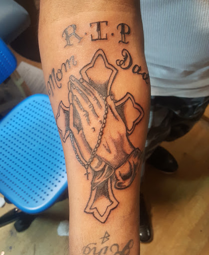 Explore lion forearm tattoo ideas, creative tattoo ideas in Raleigh, available at Gifted Styles