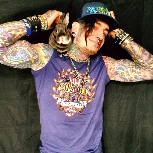 Explore dolphin tattoo ideas for females, creative tattoo ideas in Hooksett, available at NH Custom Tattoo