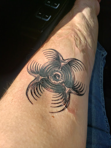 Explore switzerland tattoo ideas, creative tattoo ideas in Garden City, available at Talon Tattoo Co