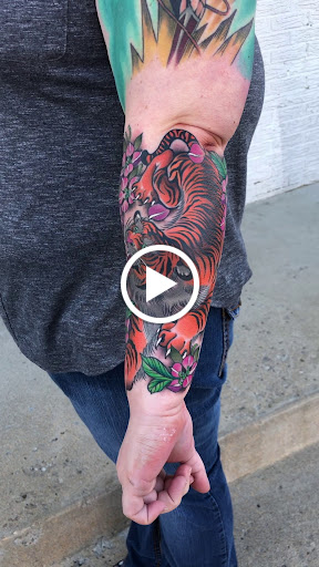 Explore paper airplane tattoo ideas, creative tattoo ideas in Erie, available at Wayward Tattoo Studio