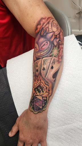 Explore negative space tattoo ideas, creative tattoo ideas in Stuart, available at Tiger Shark Tattoo Studio