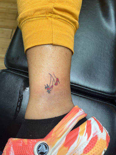 Explore fingerprint heart tattoo ideas, creative tattoo ideas in Newark, available at Bad Intentionz Tattoo & Piercings Studio