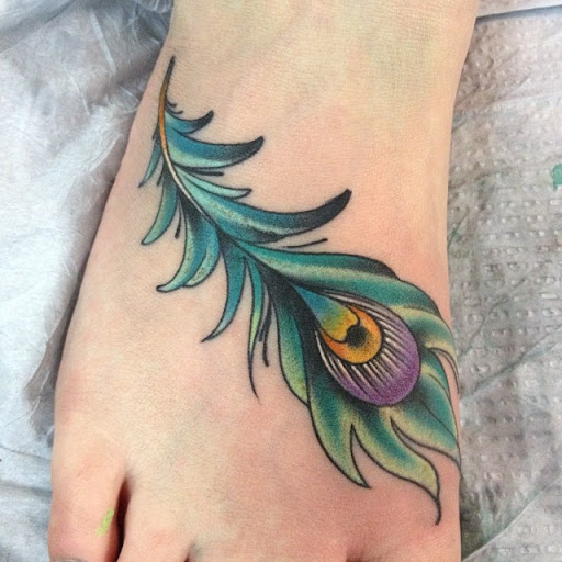 Explore tattoos behind ear ideas, creative tattoo ideas in Dekalb, available at Proton Tattoo