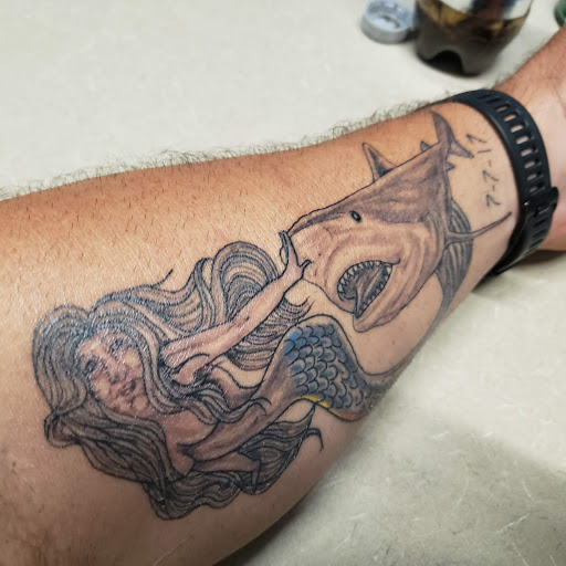 Explore female dragon tattoo ideas, creative tattoo ideas in Edison, available at Rorschach Gallery