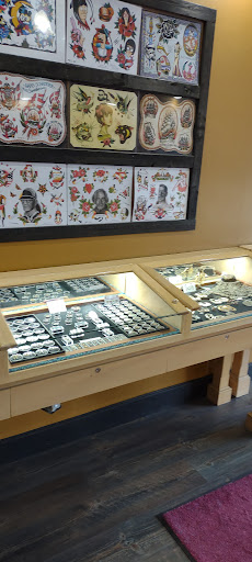 Explore violet tattoo ideas, creative tattoo ideas in Lake George, available at Lake George Tattoo Company